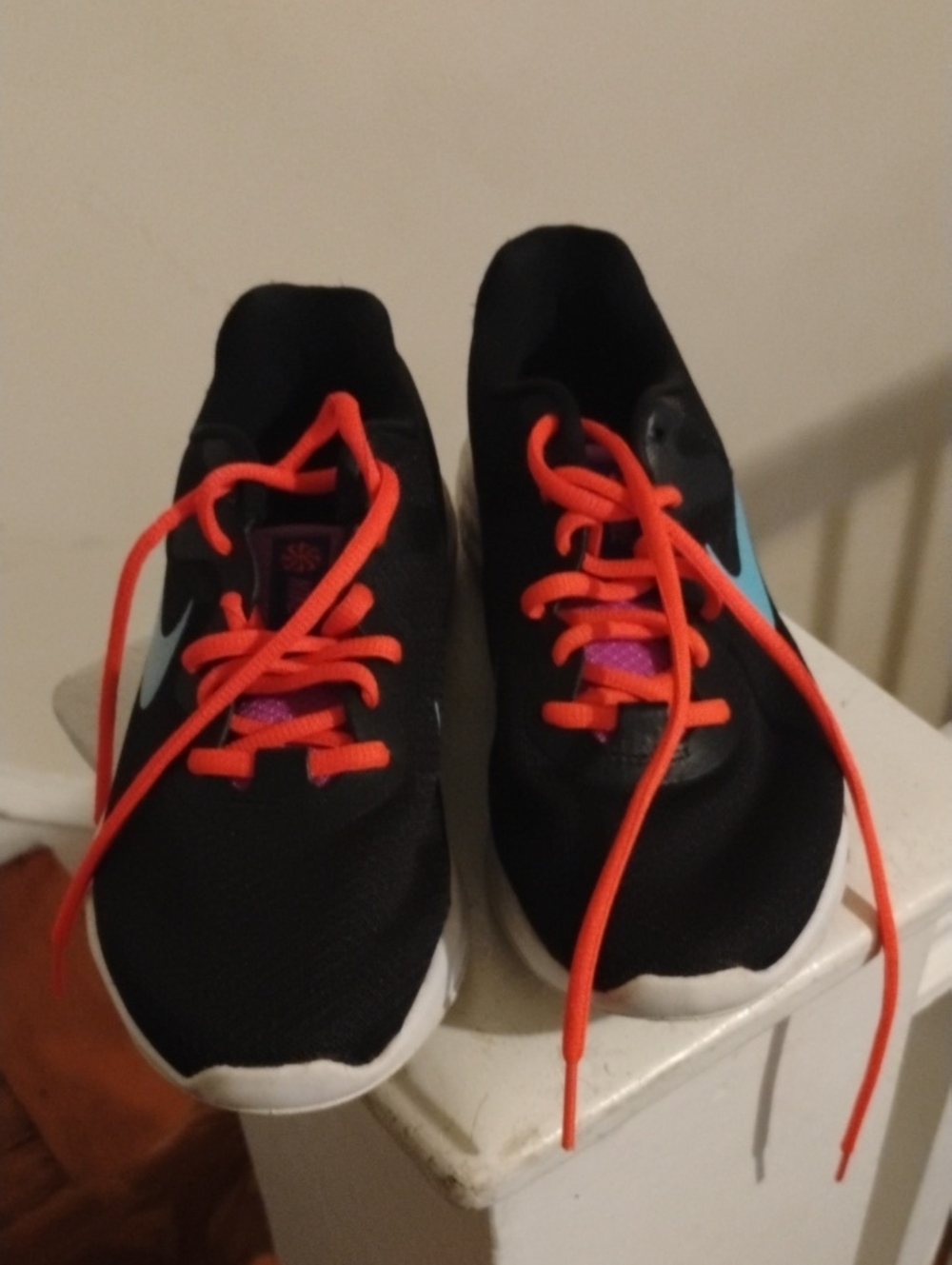 Nike Women's Black Sneakers with Bright Orange Laces and Light Blue Swoosh